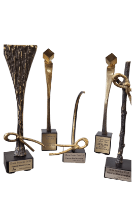 statuetki otrzymane przez Pracownię Krawiecką Atelier Hanny Bieńkowskiej za suknie na eleganckie imprezy szyte na miarę